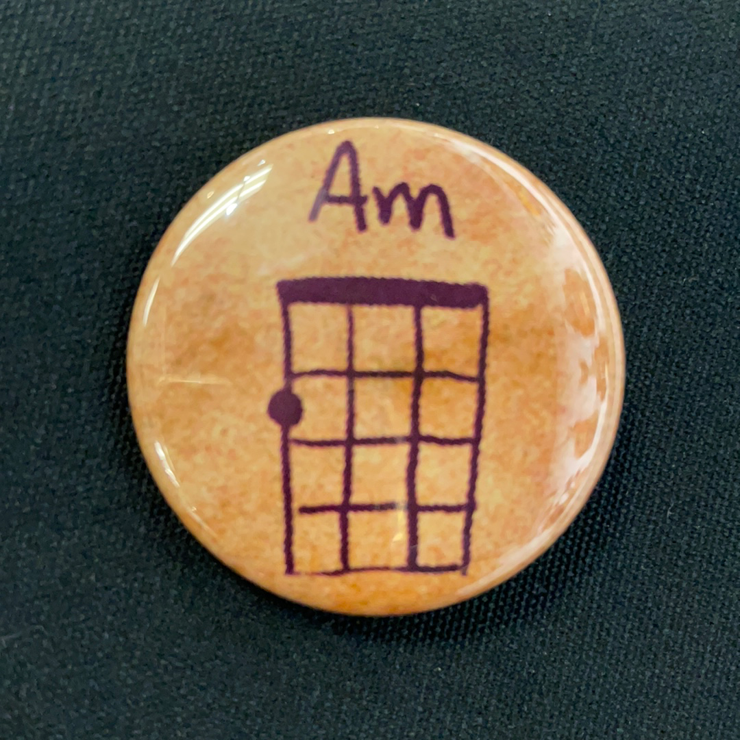 UM Badge - A minor chord